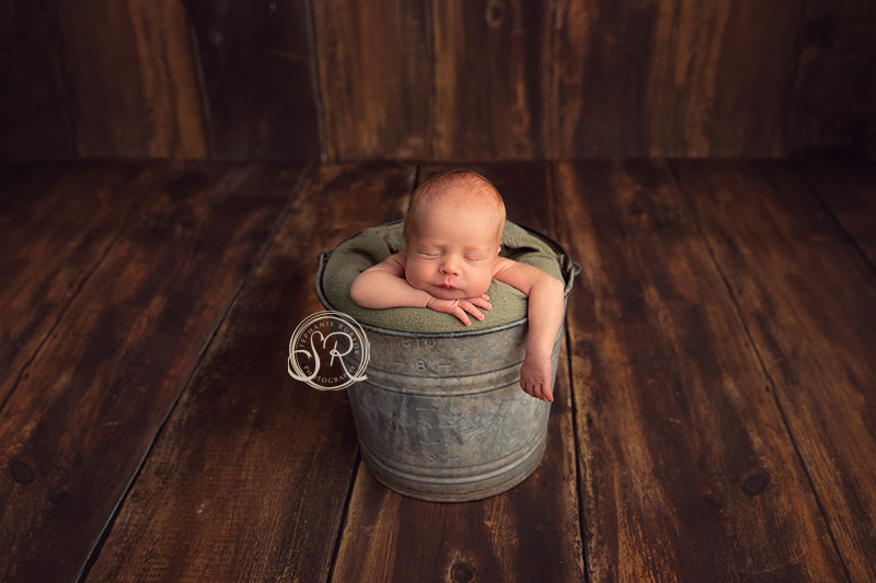 infant in bucket