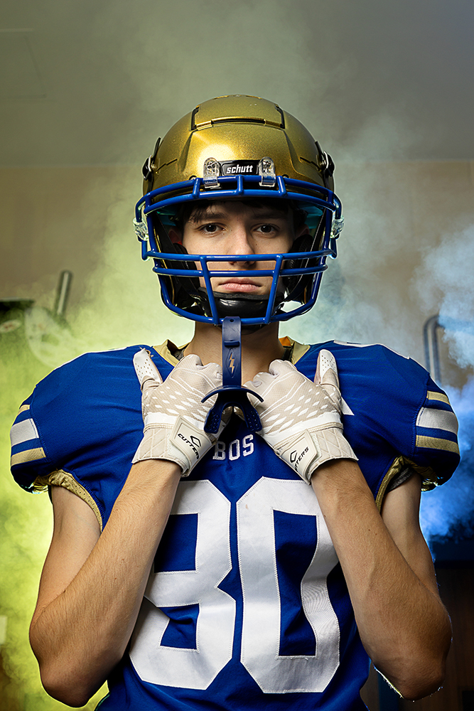 Football players posing for sports portraits at the local high school in Saginaw.