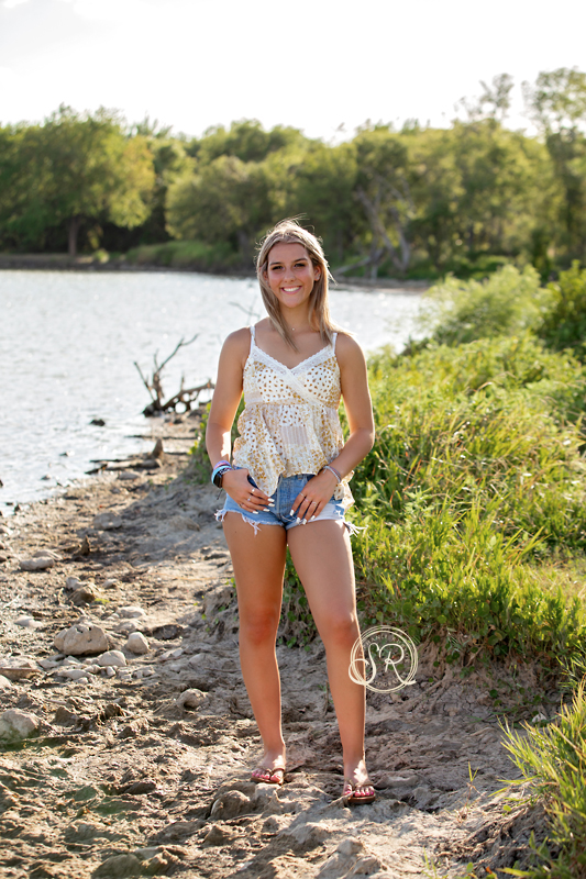 Senior teen having a photo session at Marine Creek Lake in Fort Worth, Texas. 
