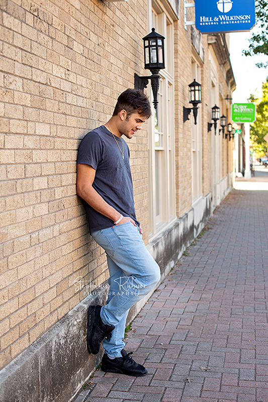 Stephanie Rubyor Photography has Weston posing for his senior pictures in downtown Fort Worth. 