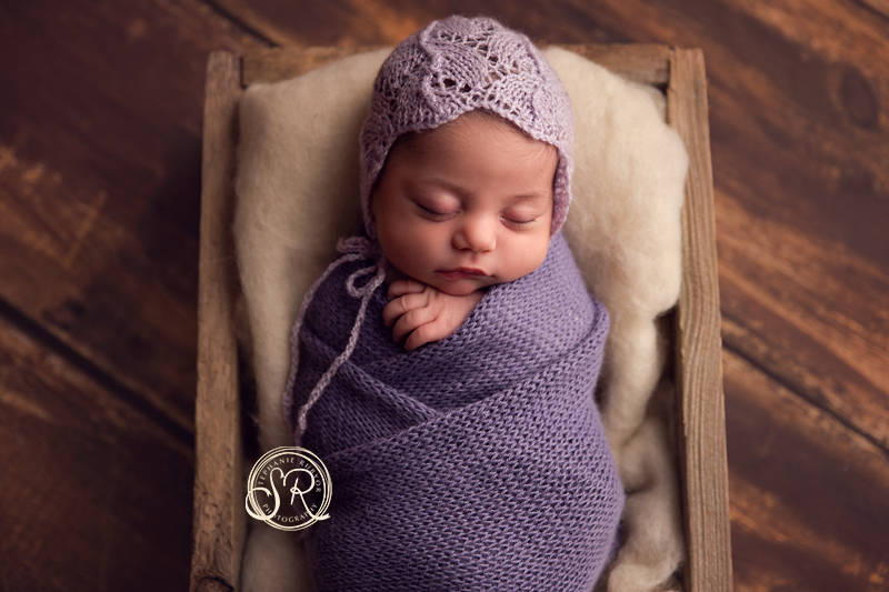 Stephanie Rubyor Photography captures newborn girl at photo shoot in Saginaw, Texas.