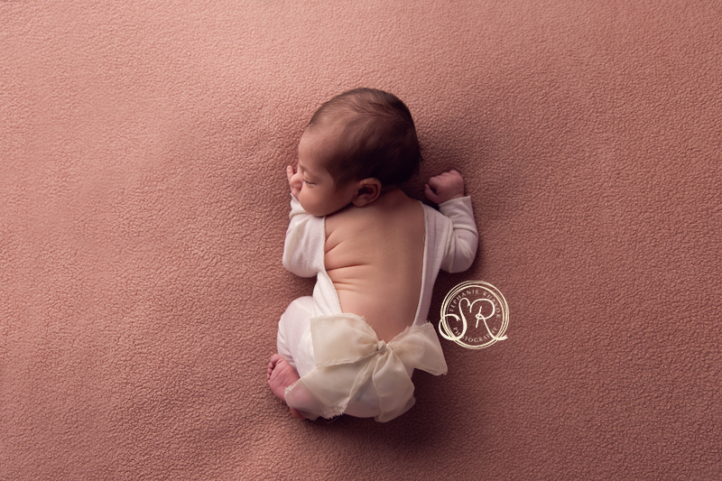 Stephanie Rubyor Photography captures newborn girl at photo shoot in Saginaw, Texas. 