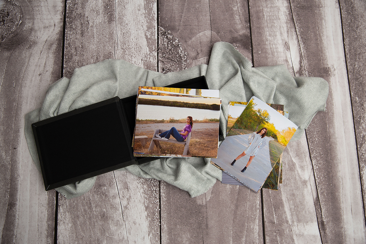 A leather bound print box is a favorite product for a senior photo session.