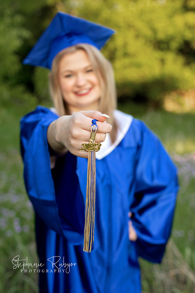 Cap and gown graduation photo session with a high school senior girl in Fort Worth, Texas. 