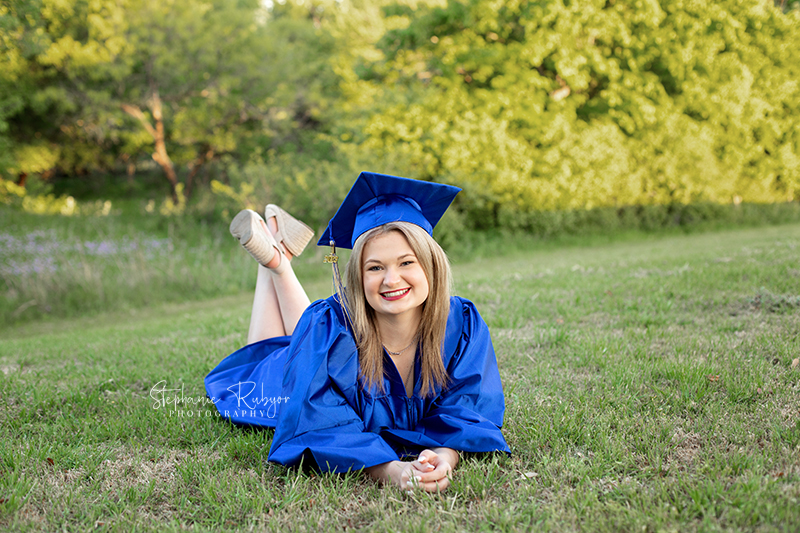 Cap and gown graduation photo session with a high school senior girl in Fort Worth, Texas.
