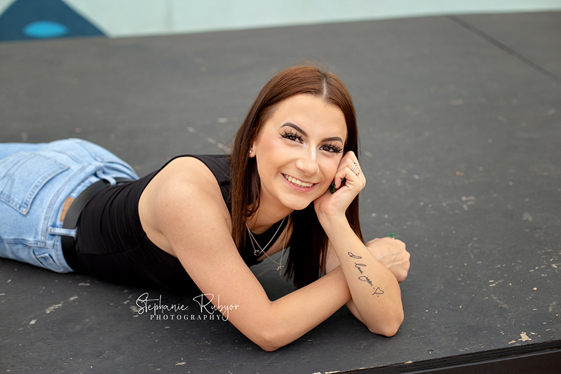 High senior photo session for girl in downtown Fort Worth at the Foundry Art District.