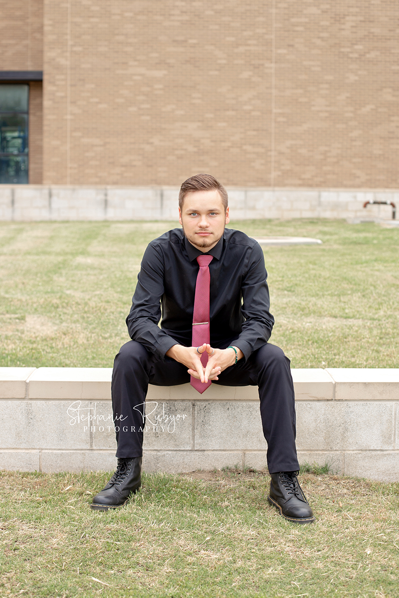 Senior boy dressed up for his photography session in Saginaw, TX. 