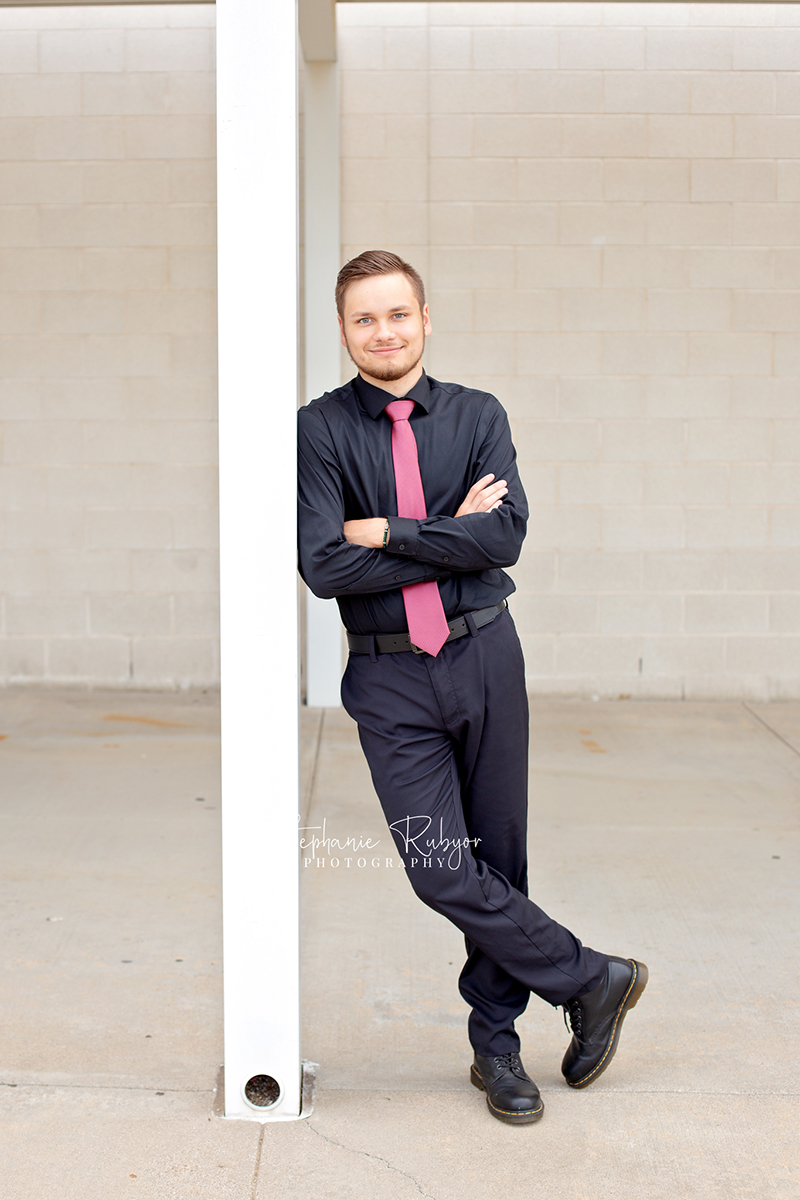 Senior boy dressed up for his photography session in Saginaw, TX.