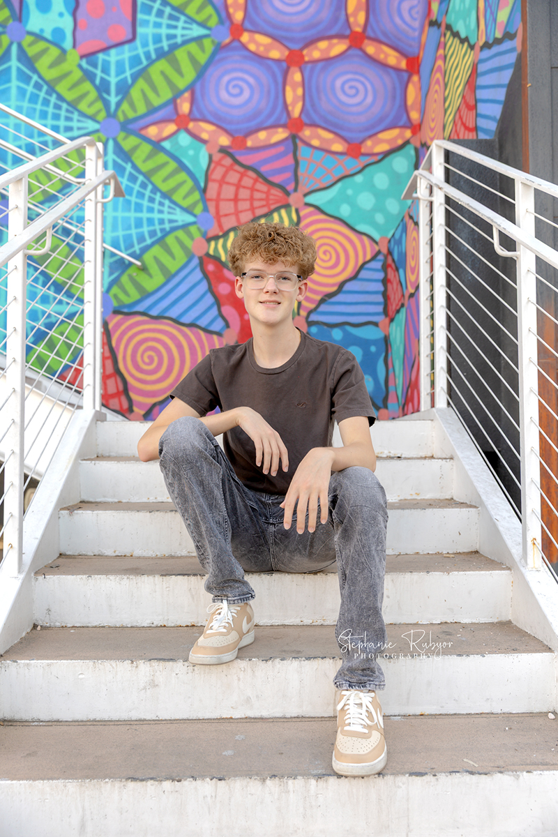 A high school senior in downtown Vegas posing for a Senior photo session by Stephanie Rubyor Photography of Fort Worth, Texas. 
