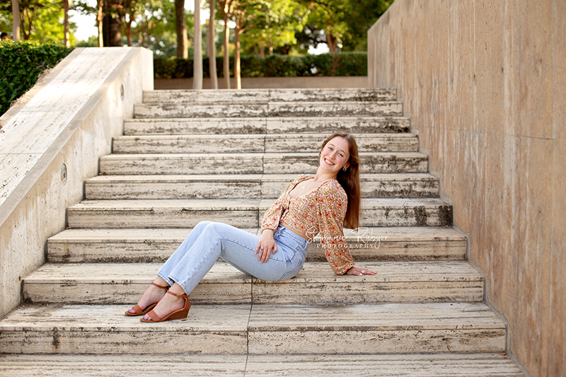 High school senior girl posing for pictures at Kimball Art Museum in downtown Fort Worth, Texas. 