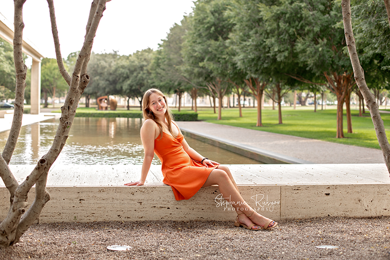 High school senior girl posing for pictures at Kimball Art Museum in downtown Fort Worth, Texas. 
