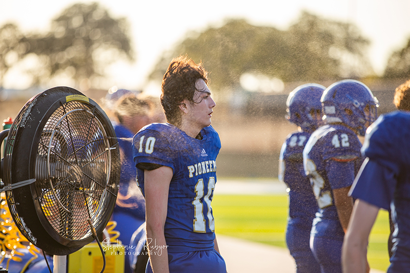 High school football player in Fort Worth, Texas playing a football game.