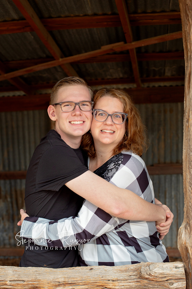 Senior guy from Las Vegas who came to Fort Worth posing for his senior pictures at Eagle Mountain Lake Park in Fort Worth, Texas. 