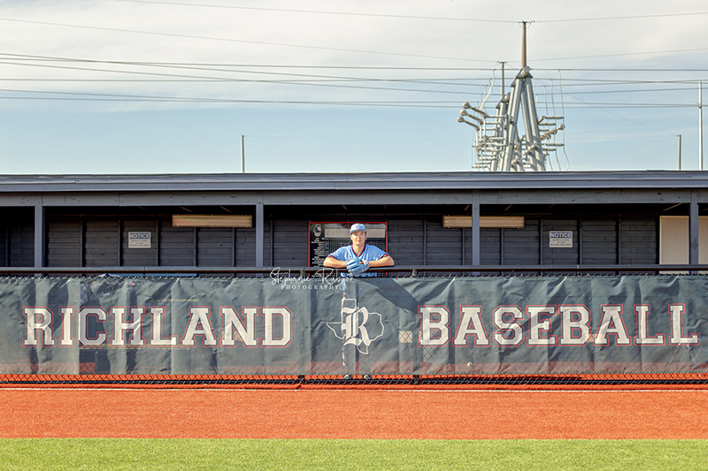 High school senior boy does some baseball sports portraits for his senior photo session in Richland Hills, Texas. 