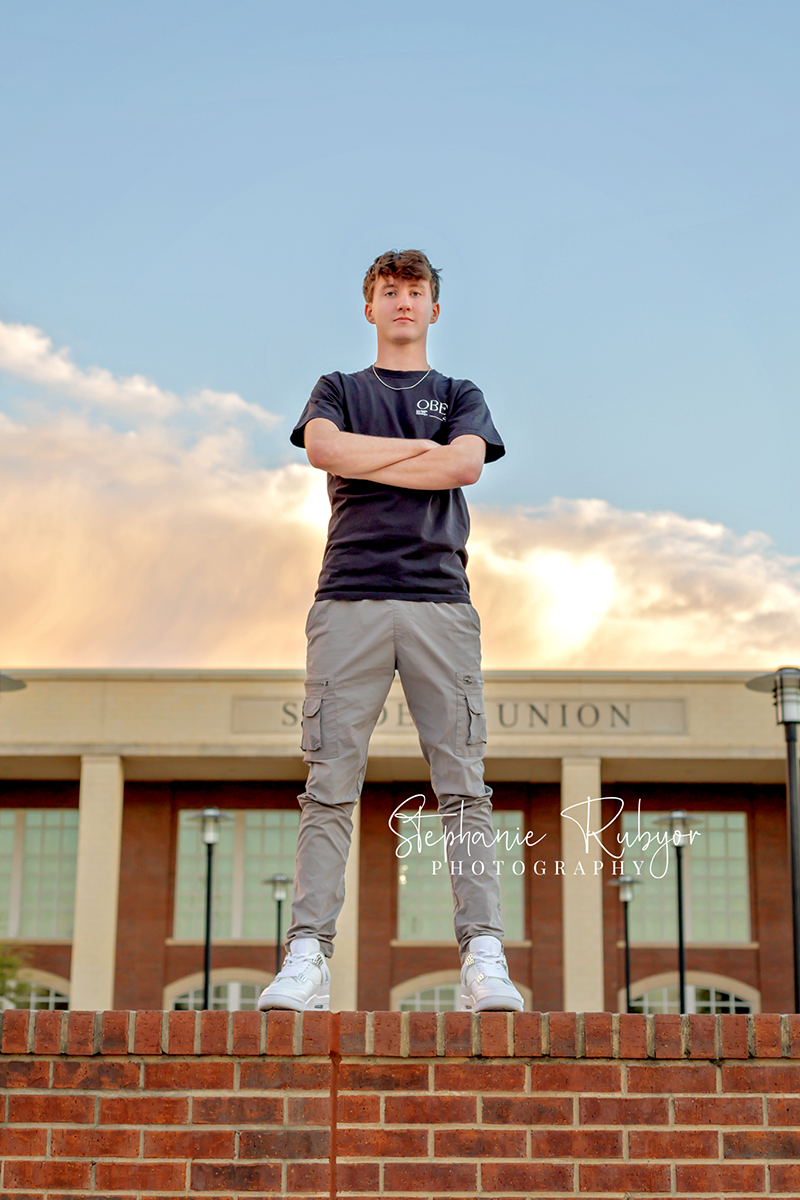 Brayden posing at Eaton High School in Haslet, Texas for his senior photo session. 