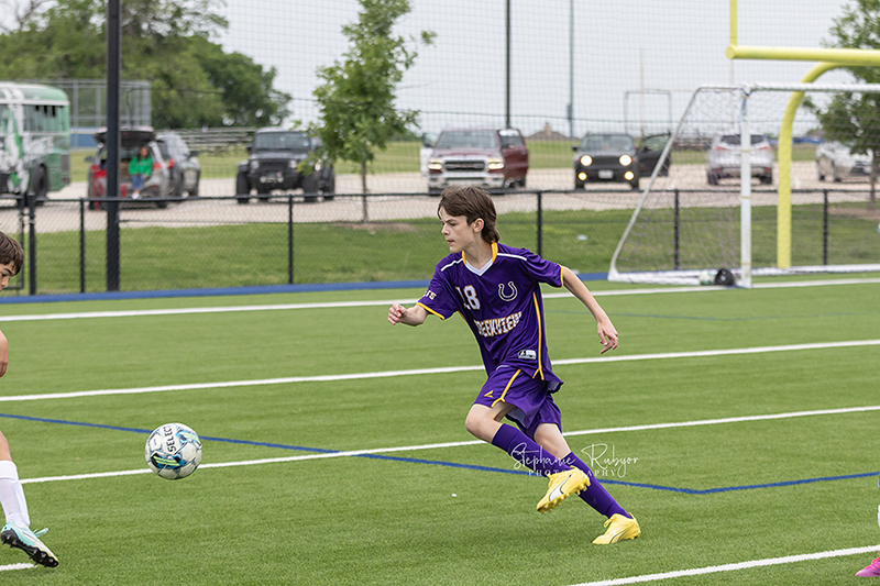 High school students playing soccer in Fort Worth, Texas. 