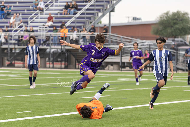 High school students playing soccer in Fort Worth, Texas. 
