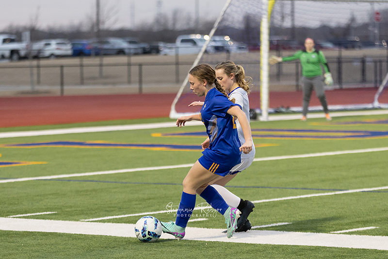 High school students playing soccer in Fort Worth, Texas. 