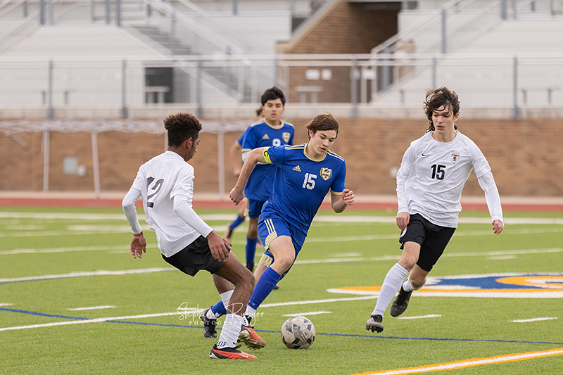 High school students playing soccer in Fort Worth, Texas. 