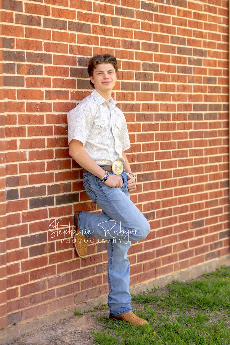 TJ having his senior pictures taken in the spring at Eagle Mountain Lake in Texas. 