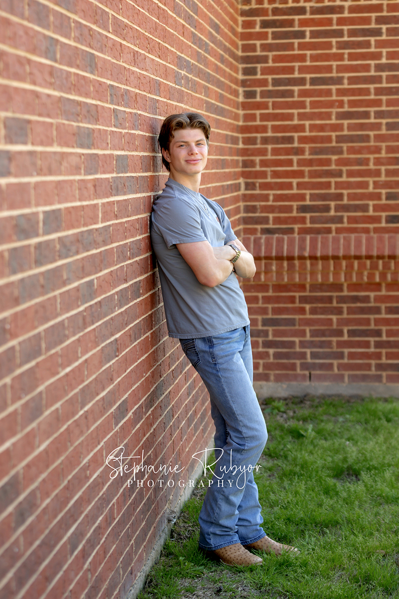 TJ having his senior pictures taken in the spring at Eagle Mountain Lake in Texas. 