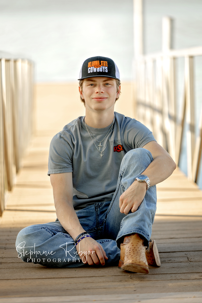 TJ having his senior pictures taken in the spring at Eagle Mountain Lake in Texas. 