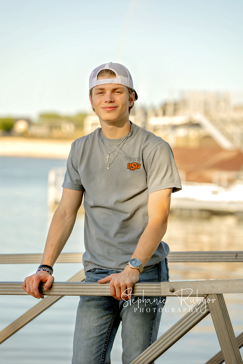 TJ having his senior pictures taken in the spring at Eagle Mountain Lake in Texas. 