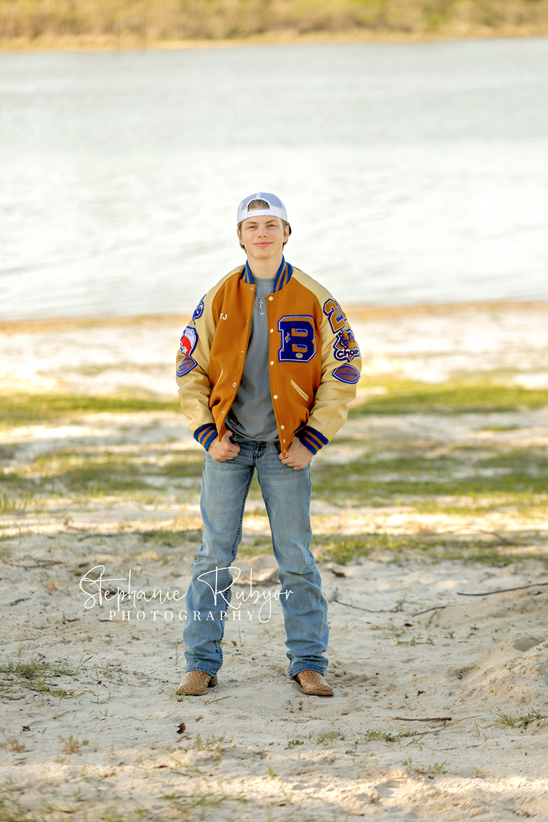 TJ having his senior pictures taken in the spring at Eagle Mountain Lake in Texas. 