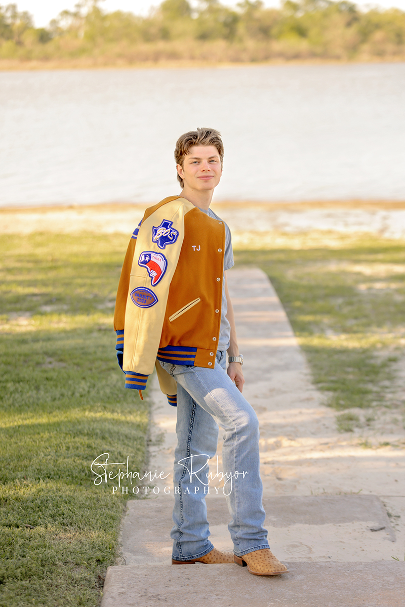 TJ having his senior pictures taken in the spring at Eagle Mountain Lake in Texas. 