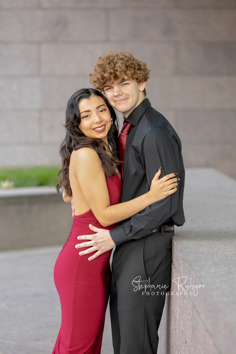 High school senior posing for Homecoming pictures at Burnett Park in Fort Worth. 