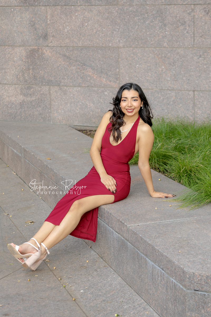 High school senior posing for Homecoming pictures at Burnett Park in Fort Worth. 
