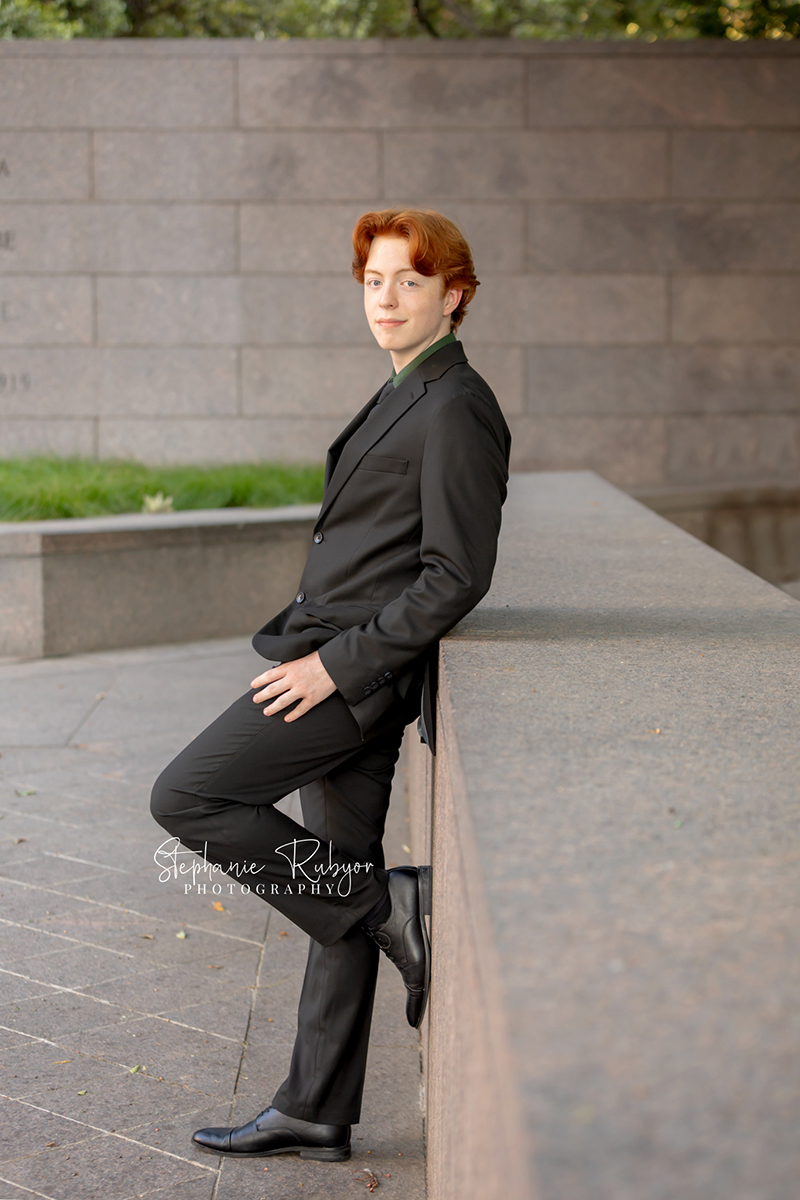 High school senior posing for Homecoming pictures at Burnett Park in Fort Worth. 