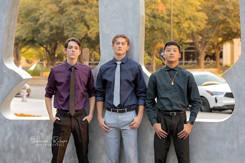 High school senior posing for Homecoming pictures at Burnett Park in Fort Worth. 