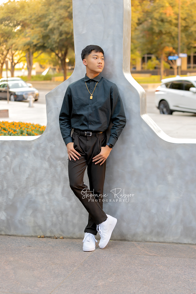 High school senior posing for Homecoming pictures at Burnett Park in Fort Worth. 