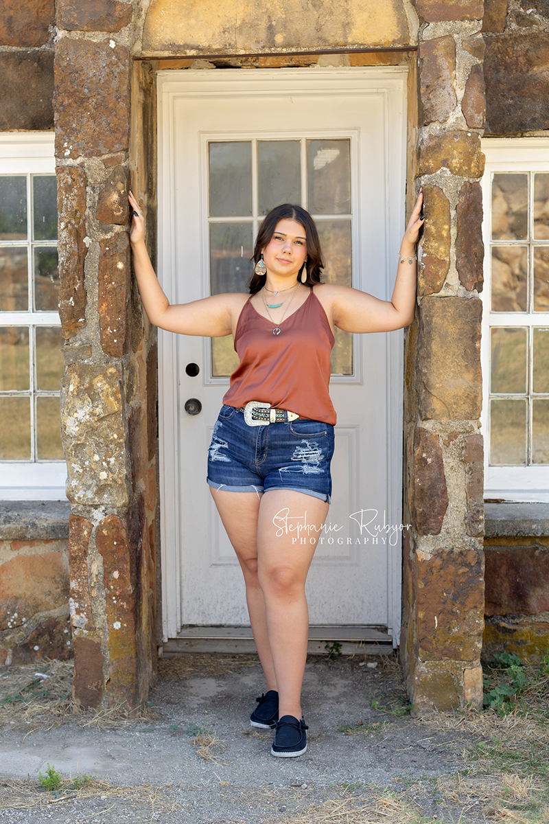 Senior girl photo session at petrified gas station in Fort Worth, Texas. 