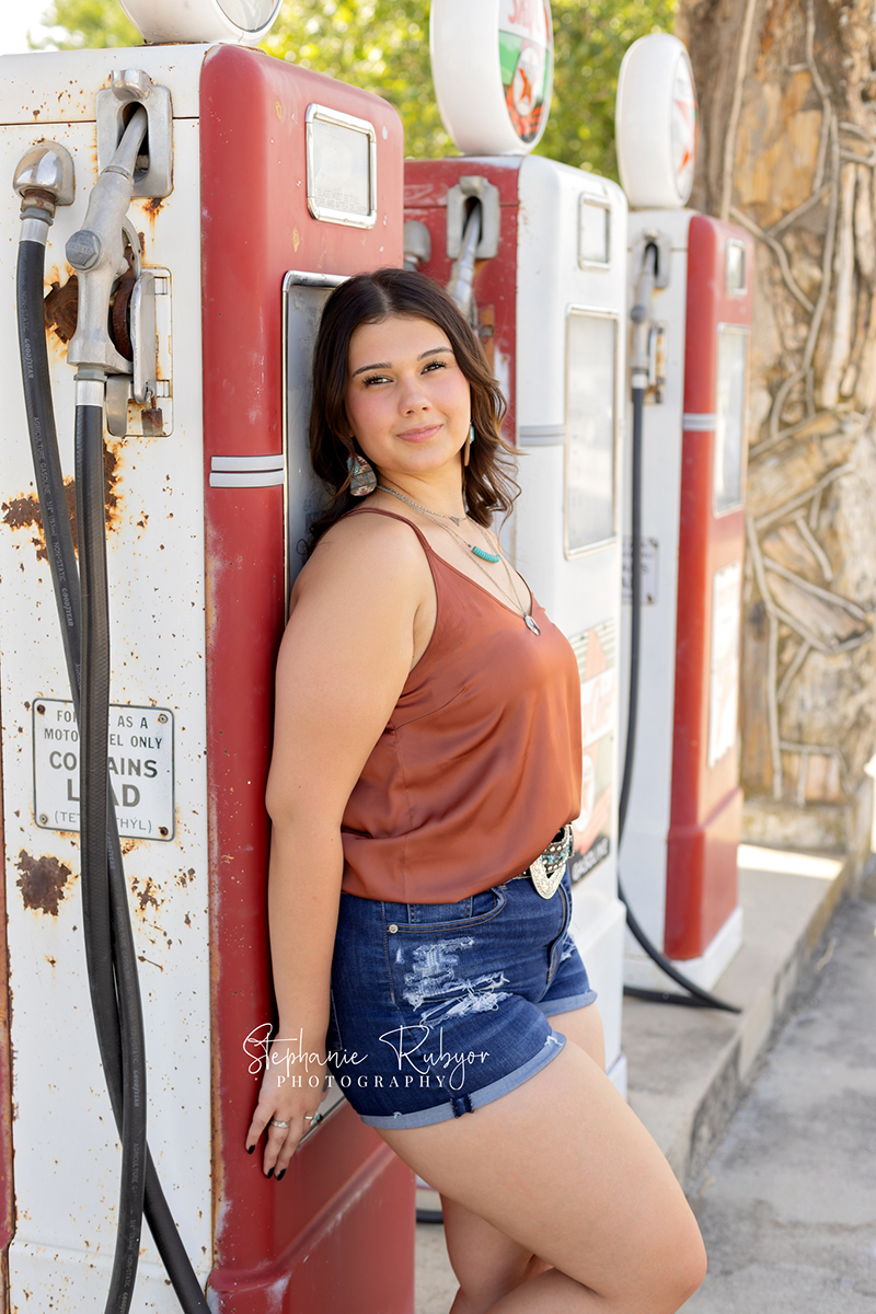 Senior girl photo session at petrified gas station in Fort Worth, Texas. 