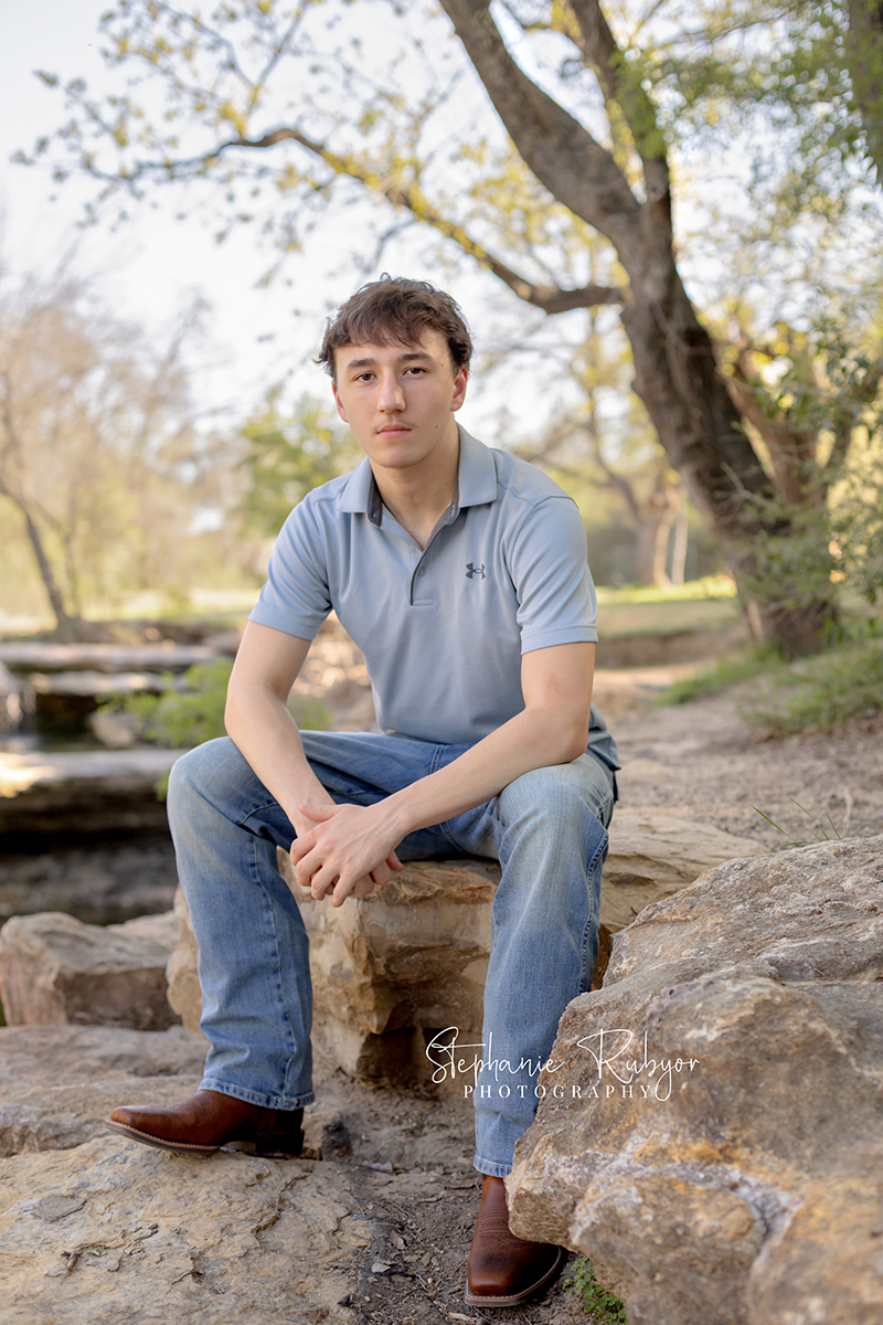 High School senior photo session at Airfield Falls in Fort Worth, Texas.