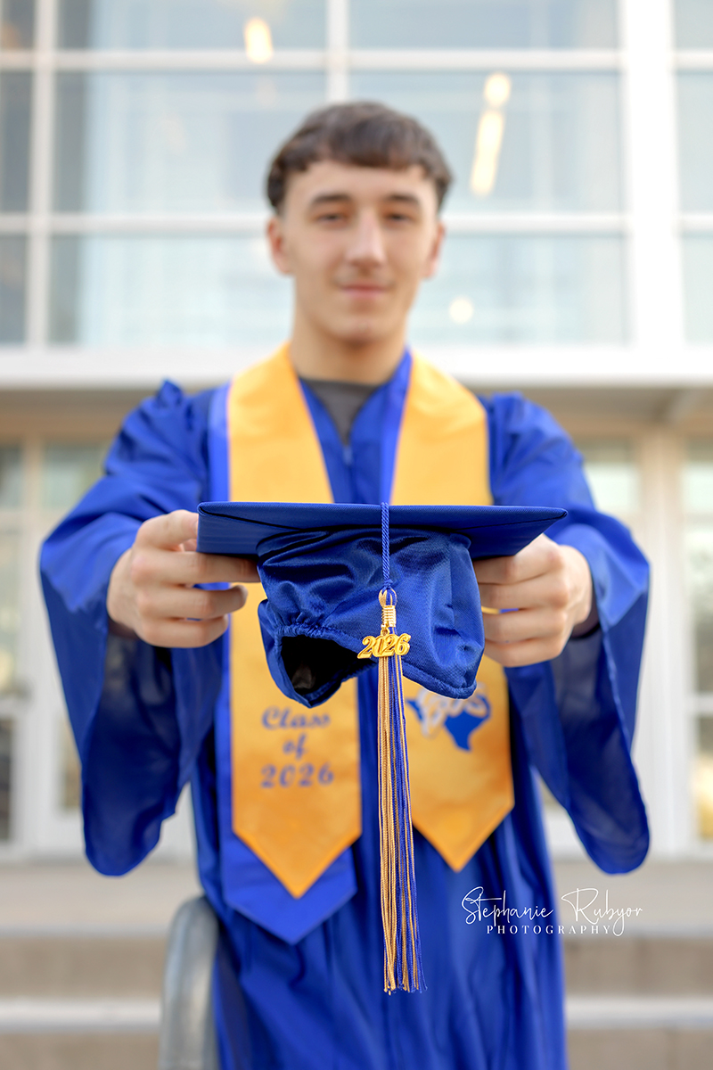 Senior photo session in graduation cap & gown at Boswell High school in Fort Worth.