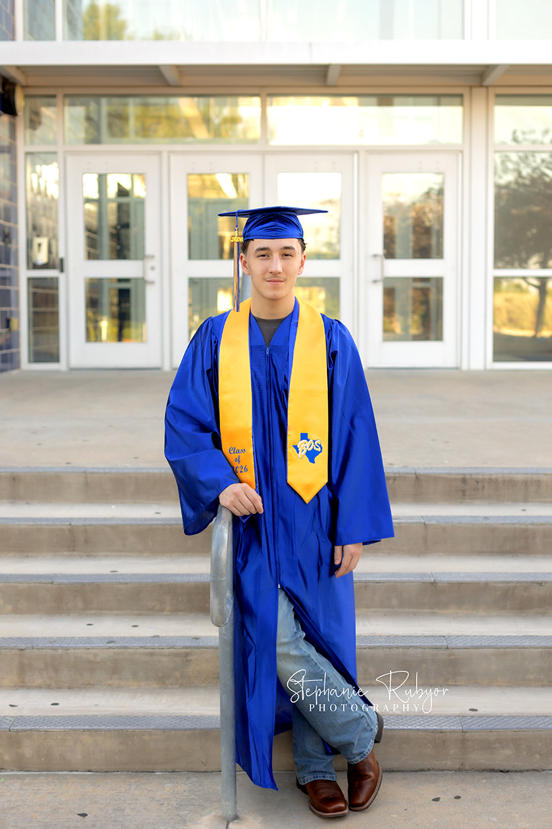 Senior photo session in graduation cap & gown at Boswell High school in Fort Worth.