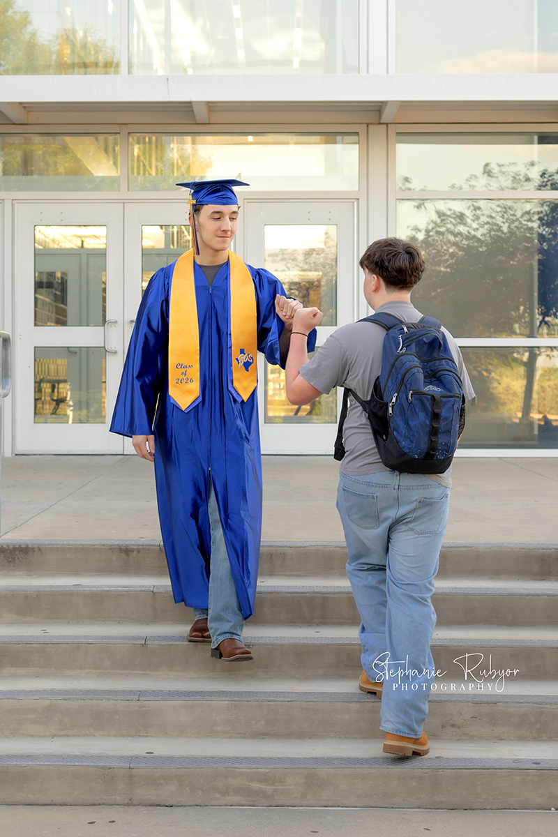Senior photo session in graduation cap & gown at Boswell High school in Fort Worth.