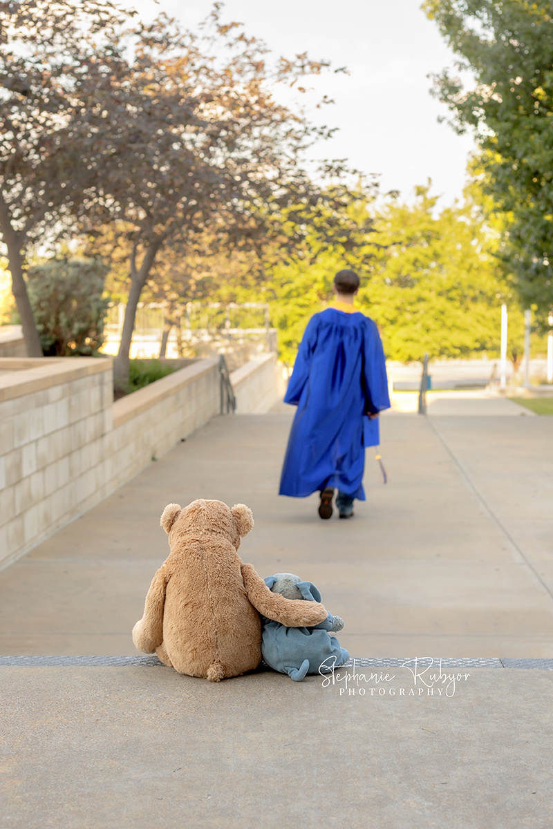 Senior photo session in graduation cap & gown at Boswell High school in Fort Worth.