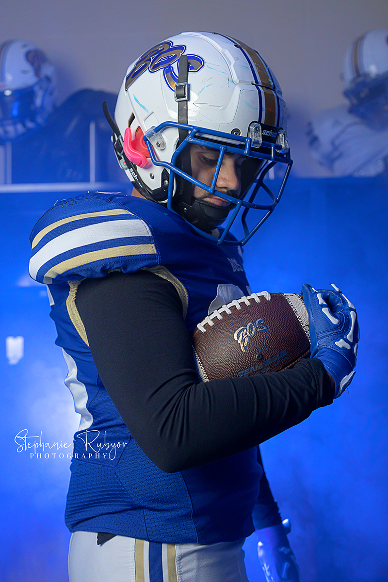 Football sport portraits at Boswell High School in the boys varsity locker room.