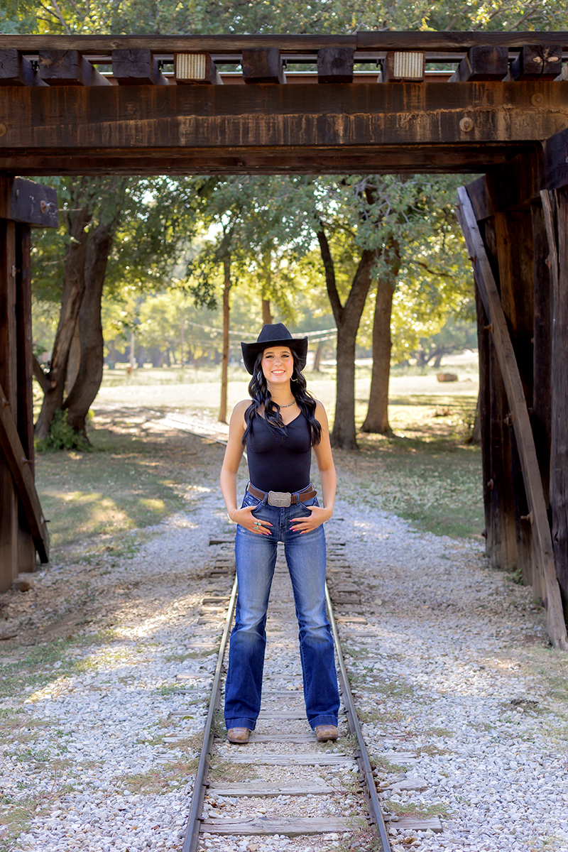 Senior picture session at Trinity Park in Fort Worth for graduate.